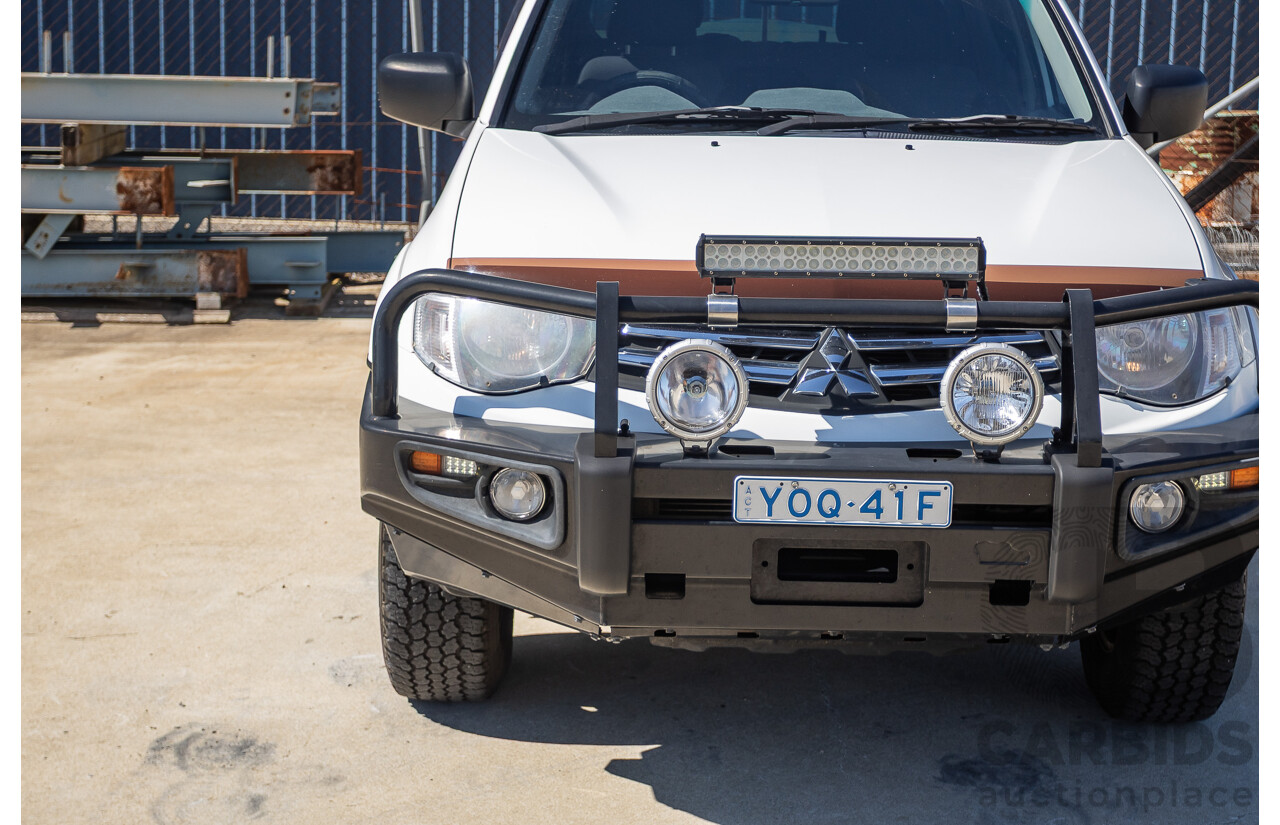 04/2015 Mitsubishi Triton GLX (4x4) MY15 Double Cab Utility White Turbo Diesel 2.5L