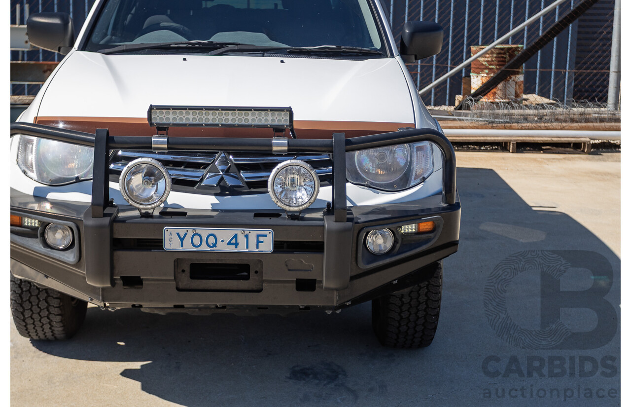 04/2015 Mitsubishi Triton GLX (4x4) MY15 Double Cab Utility White Turbo Diesel 2.5L