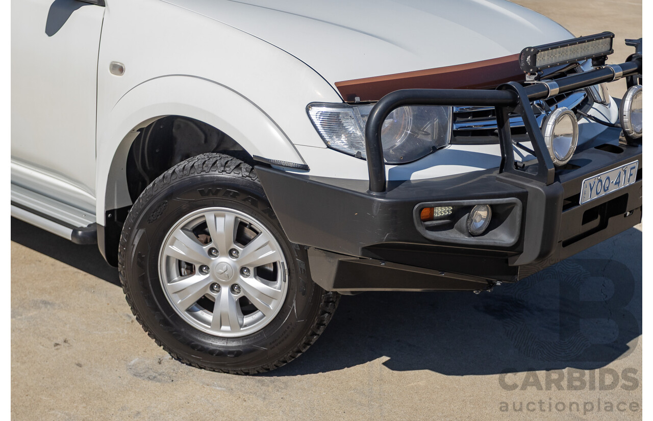 04/2015 Mitsubishi Triton GLX (4x4) MY15 Double Cab Utility White Turbo Diesel 2.5L