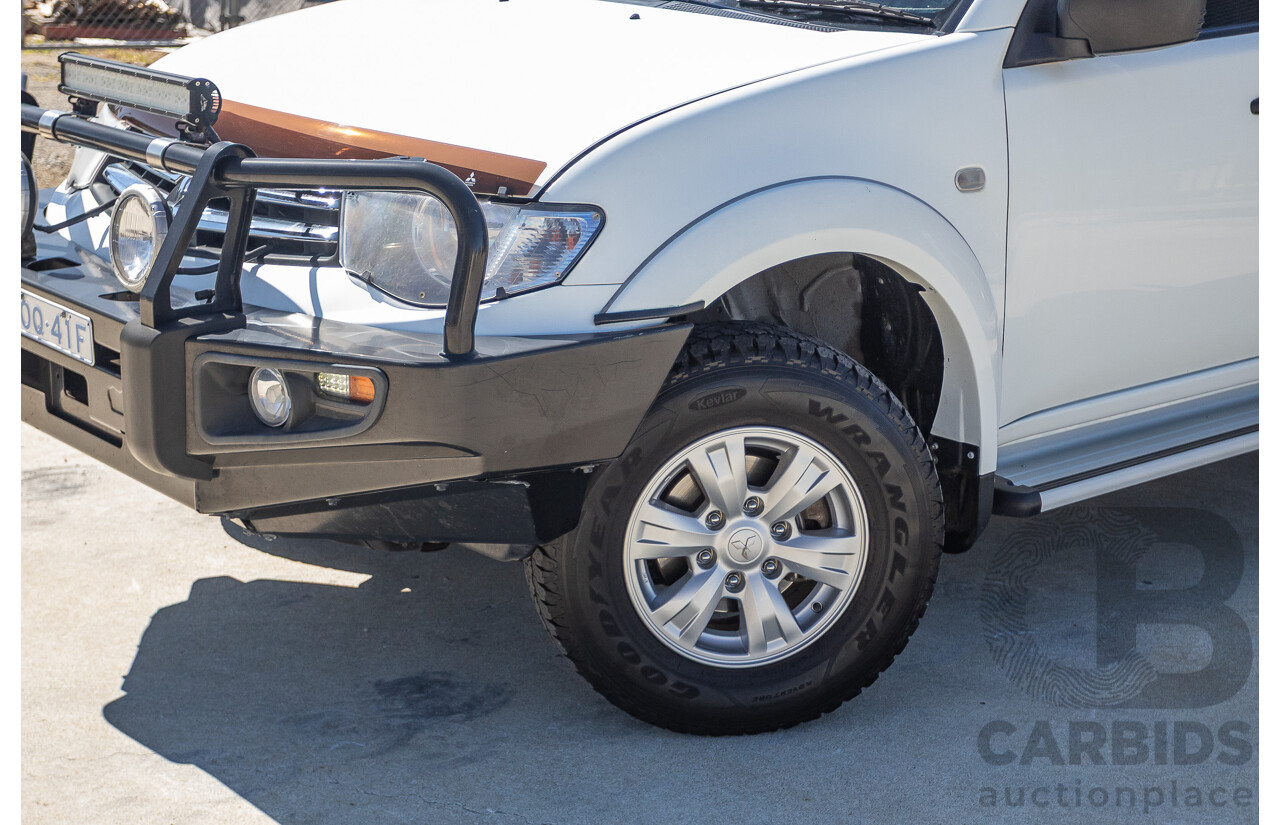 04/2015 Mitsubishi Triton GLX (4x4) MY15 Double Cab Utility White Turbo Diesel 2.5L