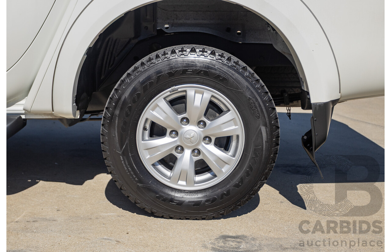 04/2015 Mitsubishi Triton GLX (4x4) MY15 Double Cab Utility White Turbo Diesel 2.5L
