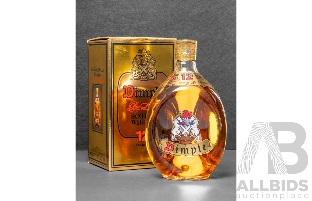 Early Bottle of Dimple De Luxe Scotch Whisky in Presentation Box