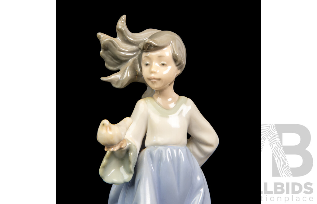 Collection of Four Porcelain Bird Whisperer Figures. Nao by Lladro