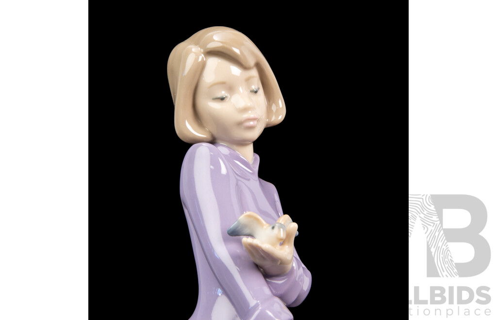 Collection of Four Porcelain Bird Whisperer Figures. Nao by Lladro