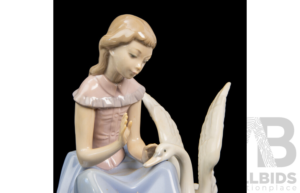 Collection of Four Porcelain Bird Whisperer Figures. Nao by Lladro
