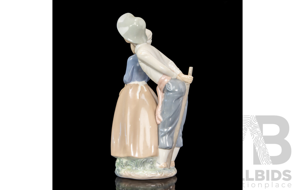 Large Porcelain ‘Goody Basket’ Figures of a Young Couple by Nao for Lladró