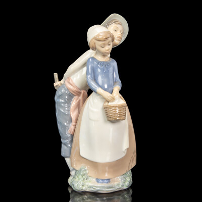 Large Porcelain ‘Goody Basket’ Figures of a Young Couple by Nao for Lladró
