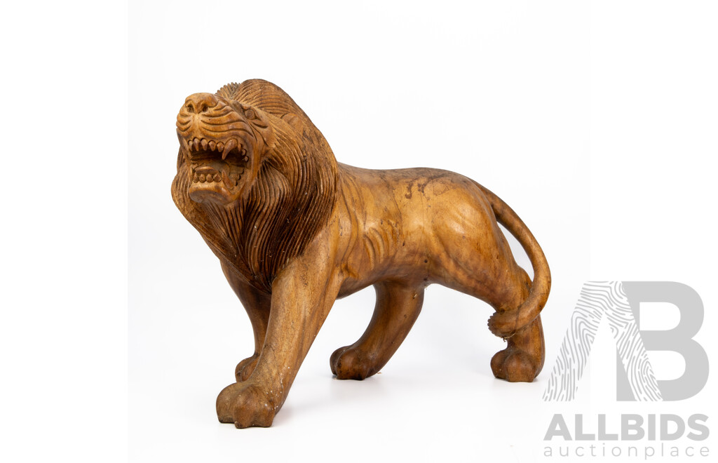 Heavily Carved Timber Stalking Lion Figure
