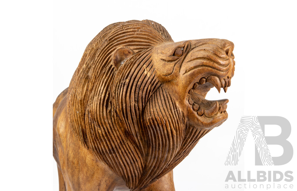 Heavily Carved Timber Stalking Lion Figure