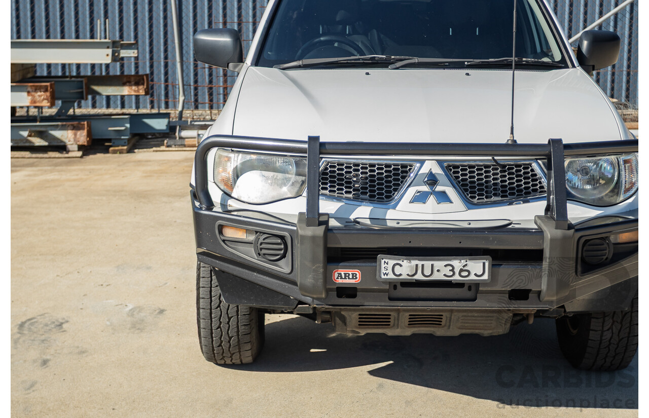 02/2013 Mitsubishi Triton GL-R (4x4) MN MY12 Double Cab Utility White Turbo Diesel 2.5L