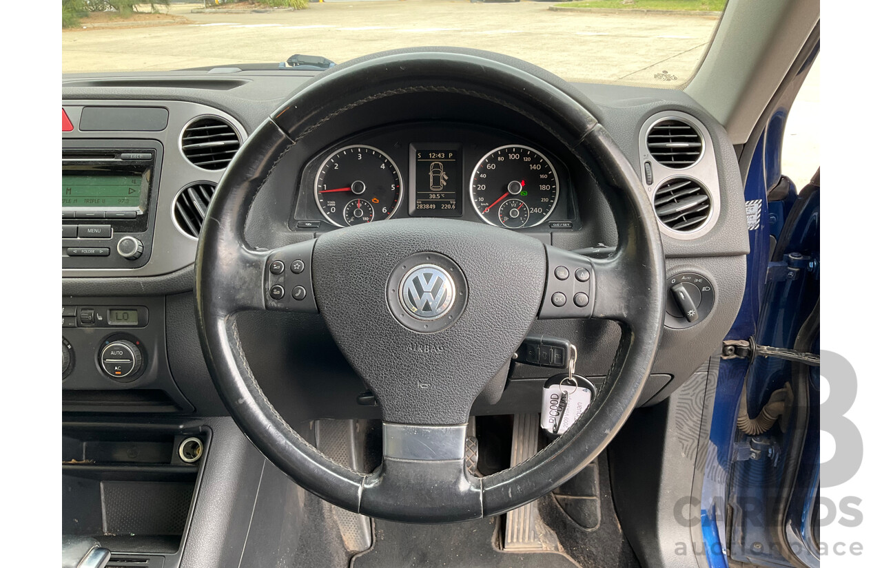 10/2009 Volkswagen Tiguan 103 TDI (AWD) 5NC MY09 4d Wagon Blue Turbo Diesel 2.0L
