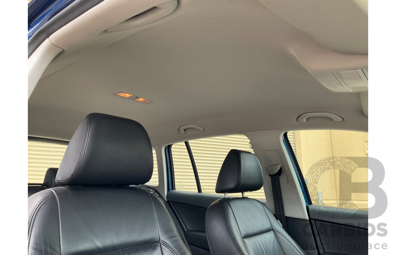 10/2009 Volkswagen Tiguan 103 TDI (AWD) 5NC MY09 4d Wagon Blue Turbo Diesel 2.0L