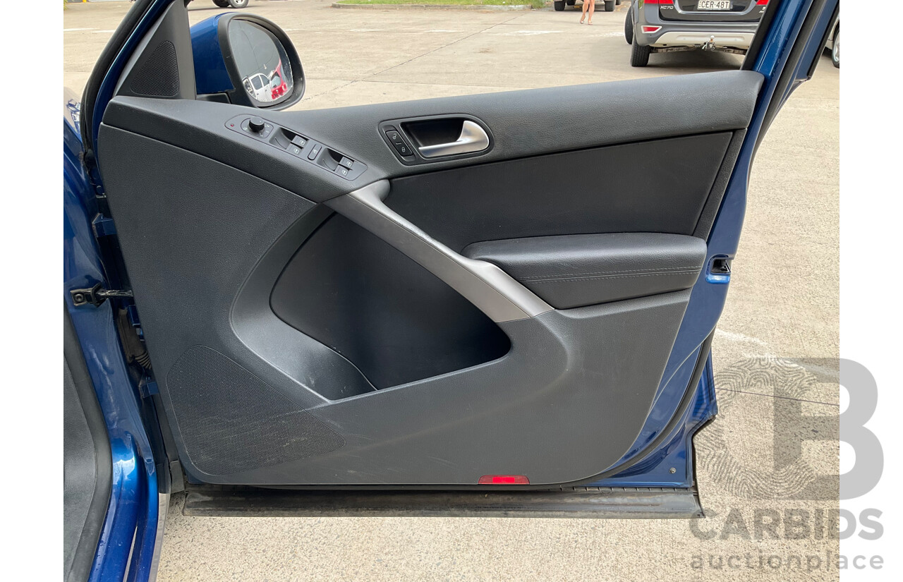 10/2009 Volkswagen Tiguan 103 TDI (AWD) 5NC MY09 4d Wagon Blue Turbo Diesel 2.0L