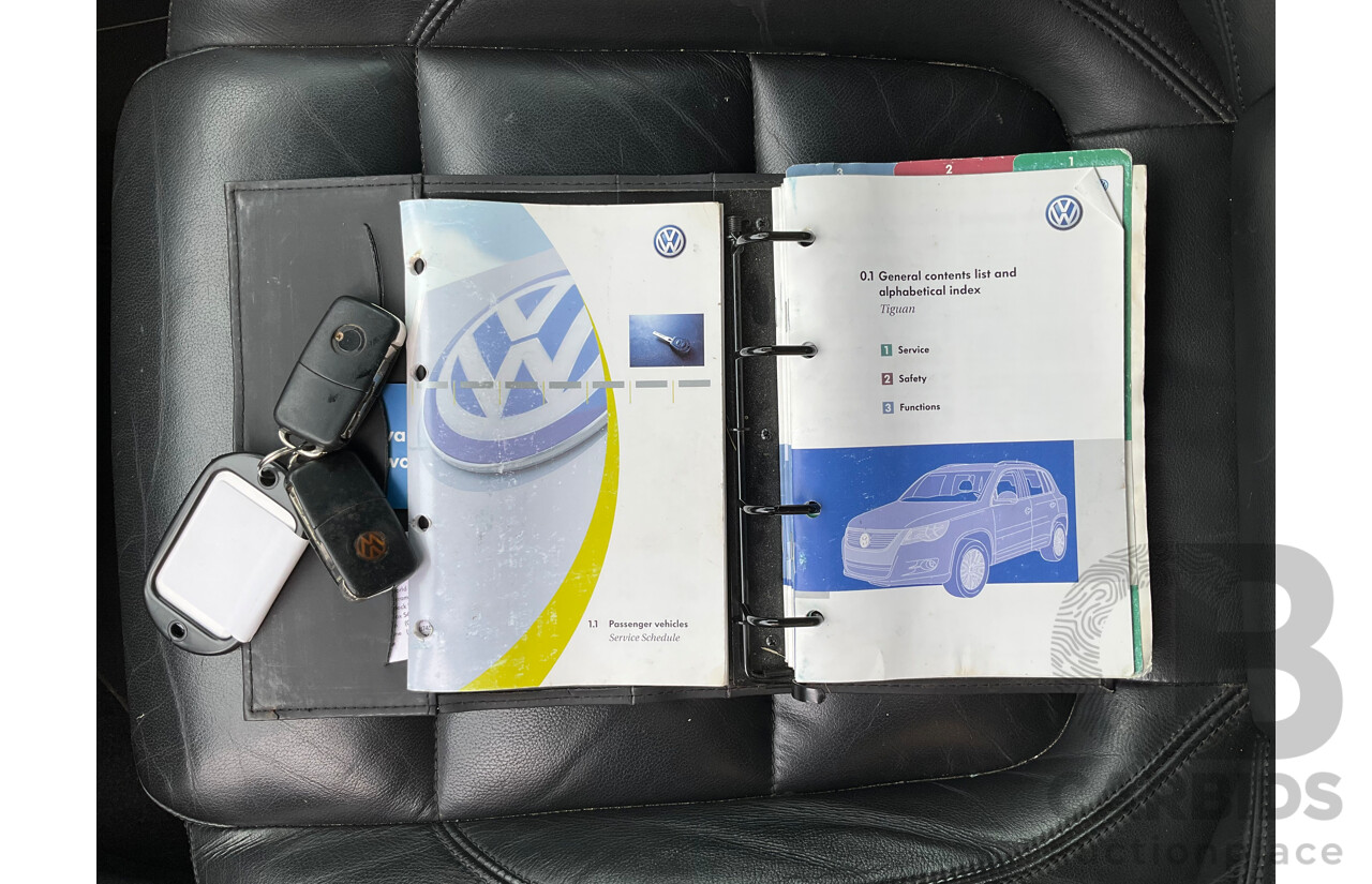 10/2009 Volkswagen Tiguan 103 TDI (AWD) 5NC MY09 4d Wagon Blue Turbo Diesel 2.0L