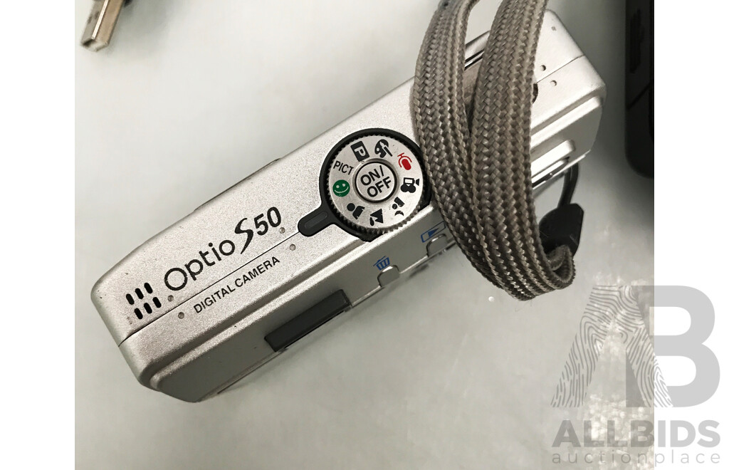 Assorted Multimedia Items - Beats by Dre Wired Headphone,  OptioS50 Digital Camera, Logitech Webcam, and More