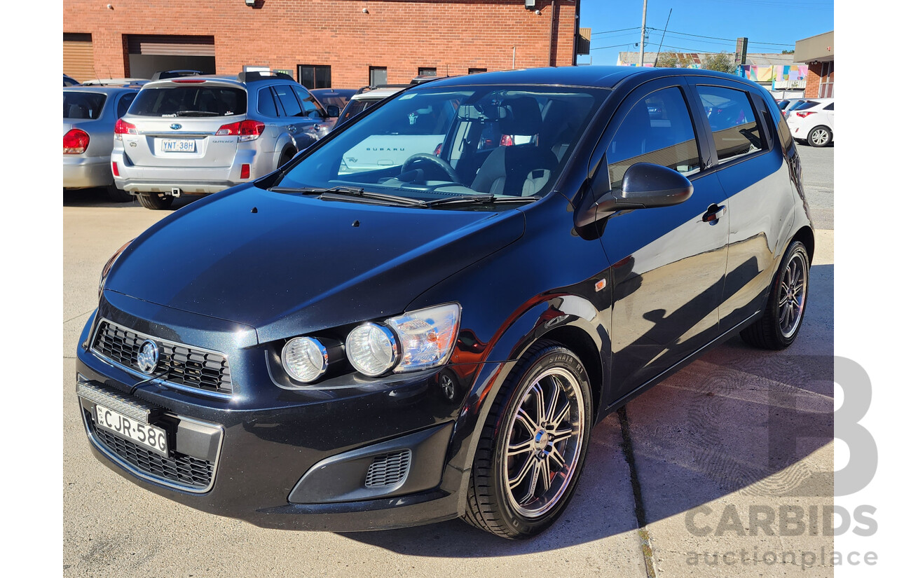8/2012 Holden Barina  TM 5d Hatchback Black 1.6L
