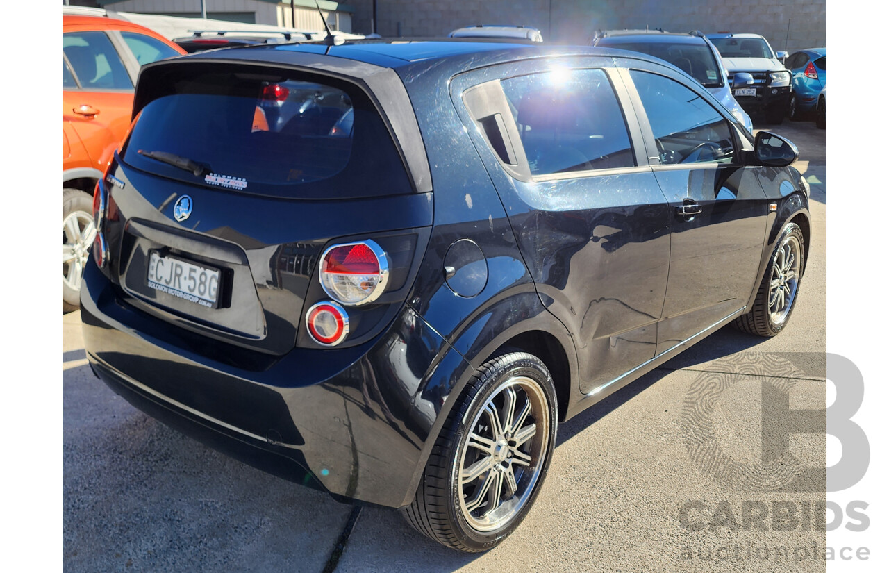 8/2012 Holden Barina  TM 5d Hatchback Black 1.6L