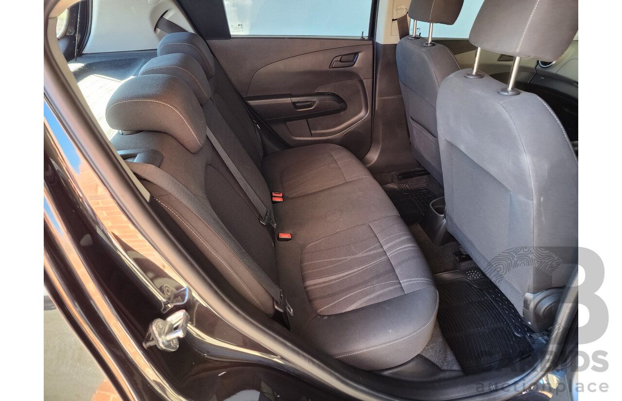 8/2012 Holden Barina  TM 5d Hatchback Black 1.6L