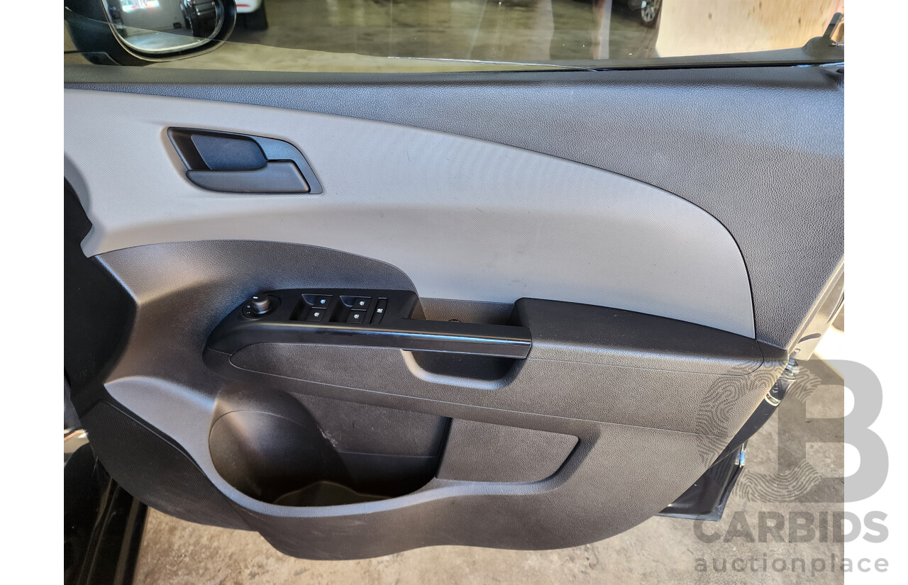 8/2012 Holden Barina  TM 5d Hatchback Black 1.6L