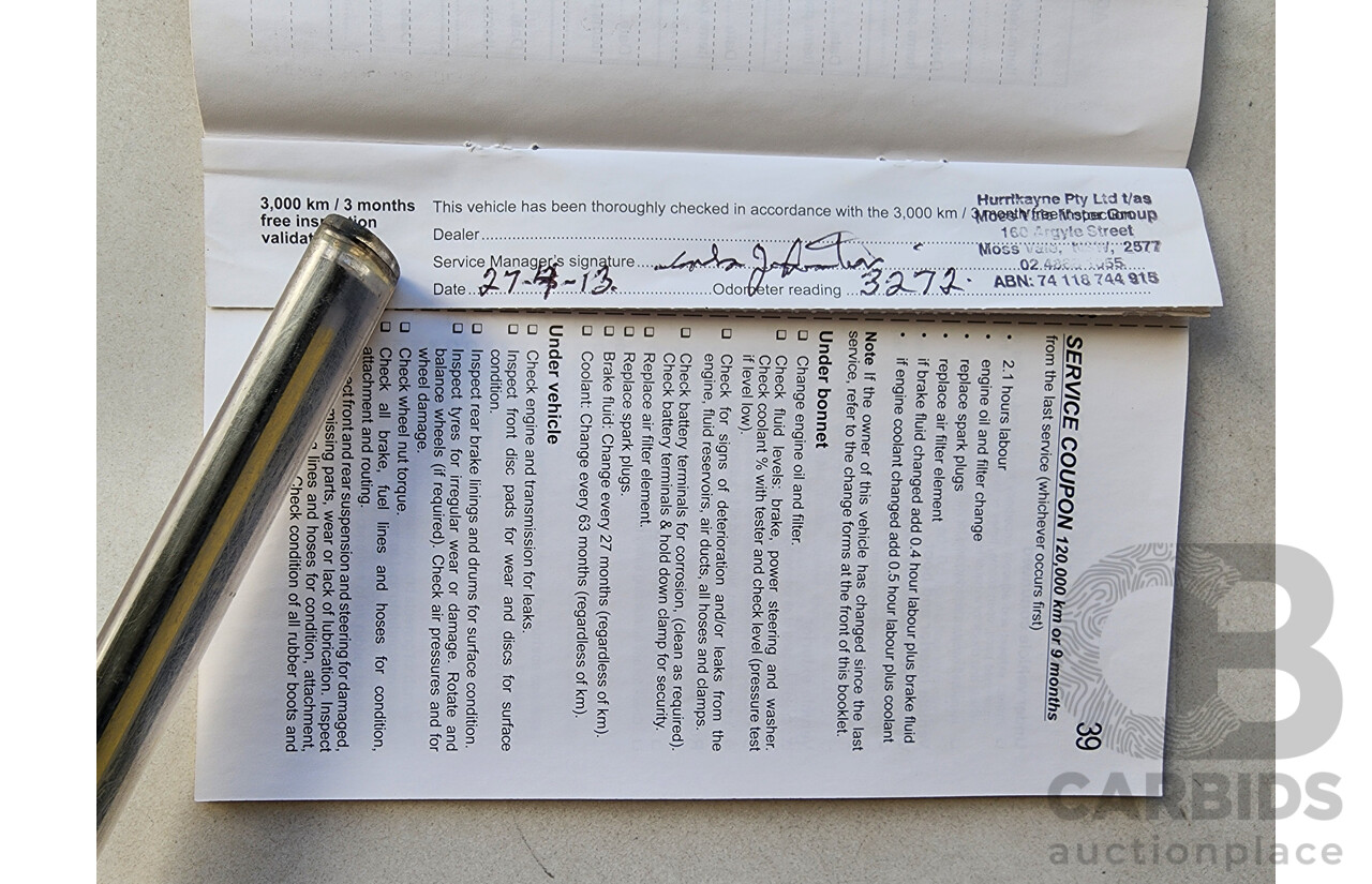 8/2012 Holden Barina  TM 5d Hatchback Black 1.6L