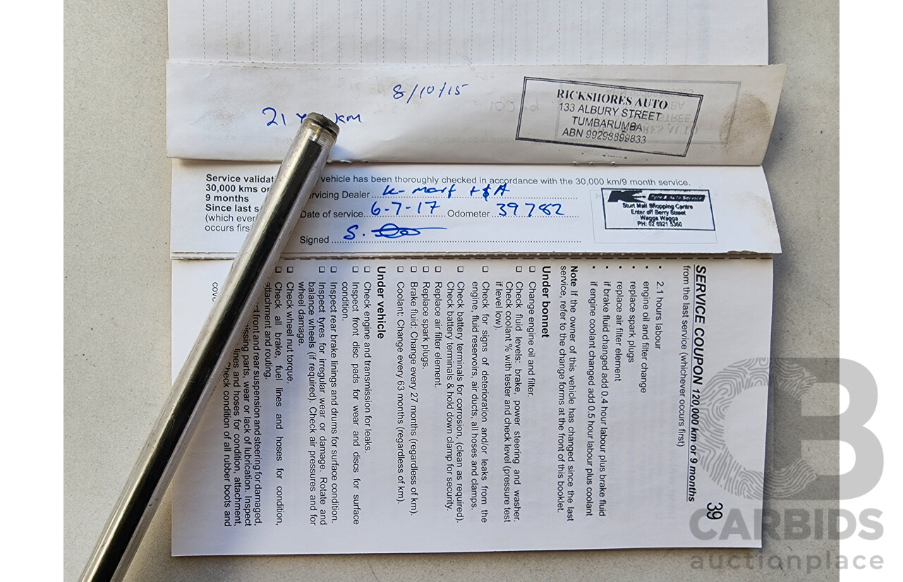 8/2012 Holden Barina  TM 5d Hatchback Black 1.6L