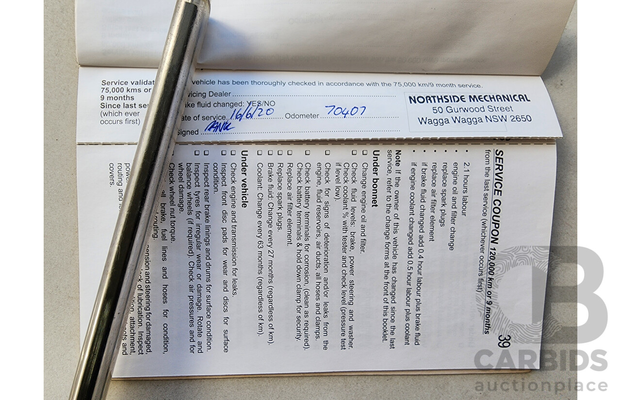 8/2012 Holden Barina  TM 5d Hatchback Black 1.6L