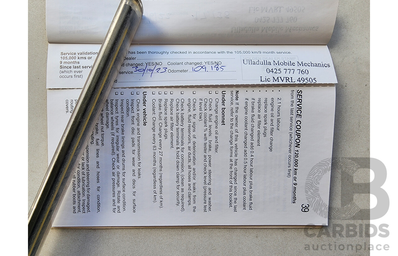 8/2012 Holden Barina  TM 5d Hatchback Black 1.6L