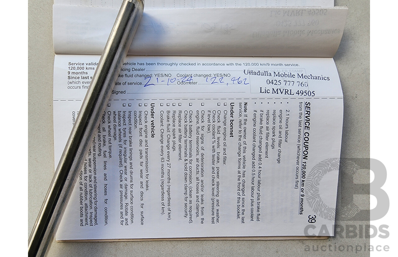 8/2012 Holden Barina  TM 5d Hatchback Black 1.6L