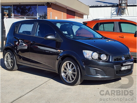8/2012 Holden Barina  TM 5d Hatchback Black 1.6L