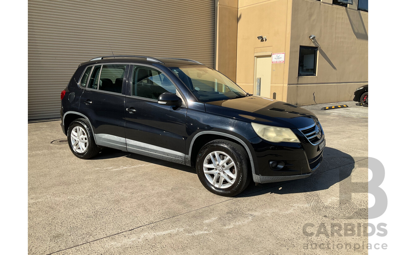 2/2010 Volkswagen Tiguan 103 TDI Pacific 5NC MY10 4d Wagon Black 2.0L