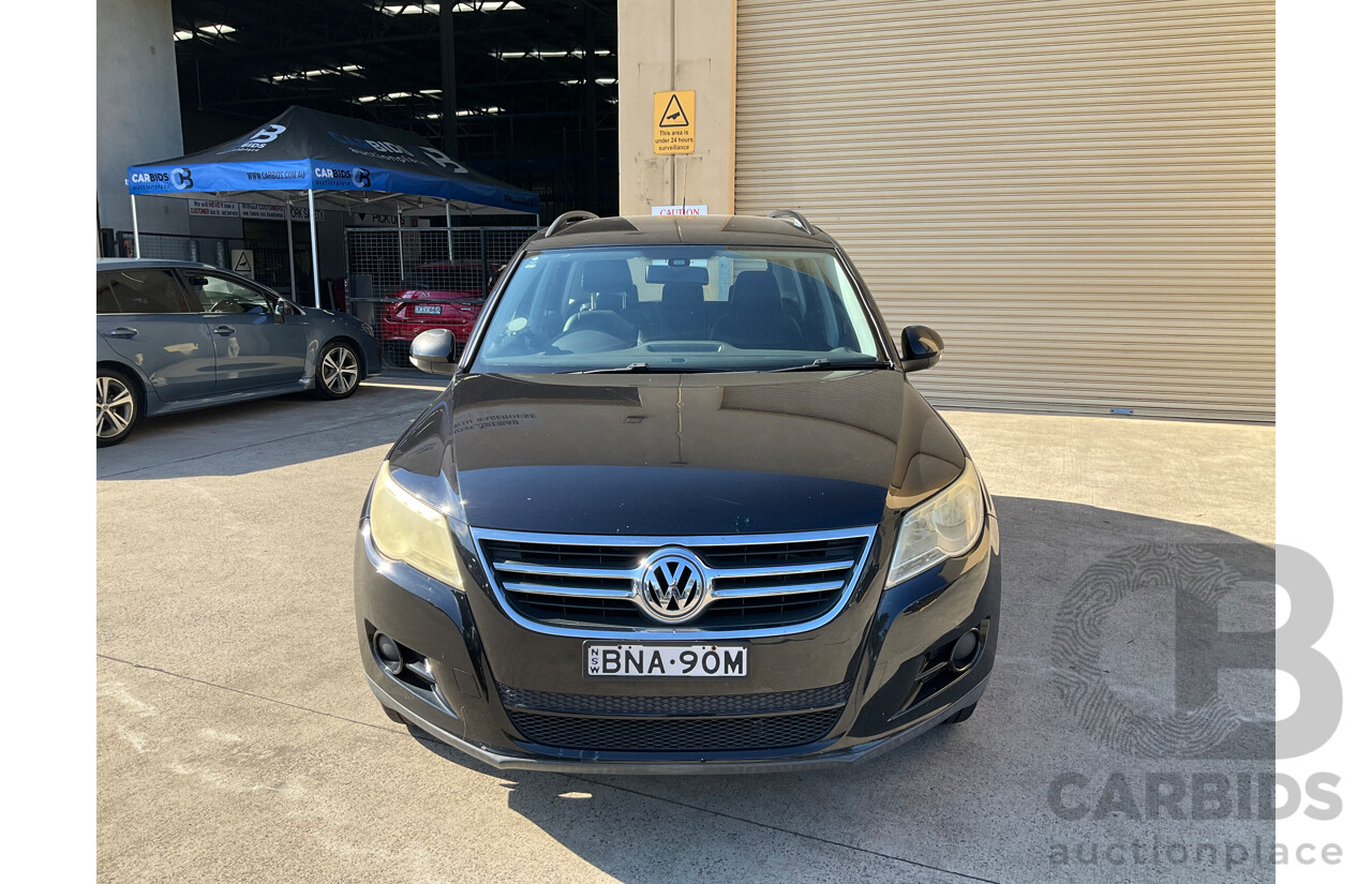 2/2010 Volkswagen Tiguan 103 TDI Pacific 5NC MY10 4d Wagon Black 2.0L