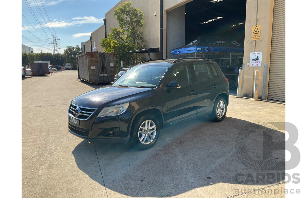 2/2010 Volkswagen Tiguan 103 TDI Pacific 5NC MY10 4d Wagon Black 2.0L