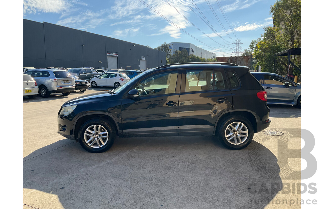 2/2010 Volkswagen Tiguan 103 TDI Pacific 5NC MY10 4d Wagon Black 2.0L