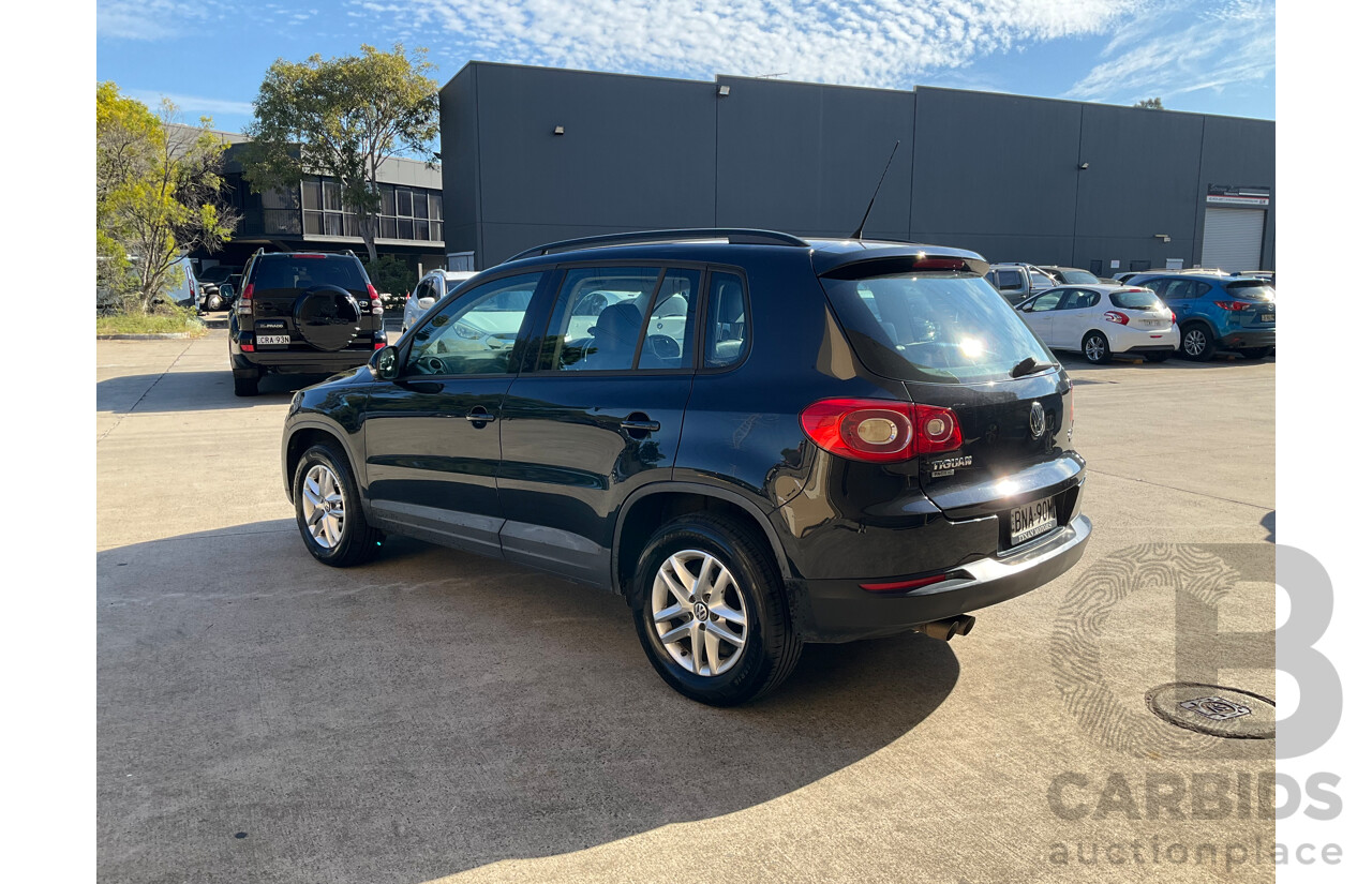 2/2010 Volkswagen Tiguan 103 TDI Pacific 5NC MY10 4d Wagon Black 2.0L