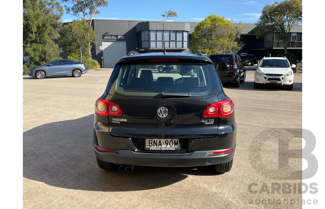 2/2010 Volkswagen Tiguan 103 TDI Pacific 5NC MY10 4d Wagon Black 2.0L