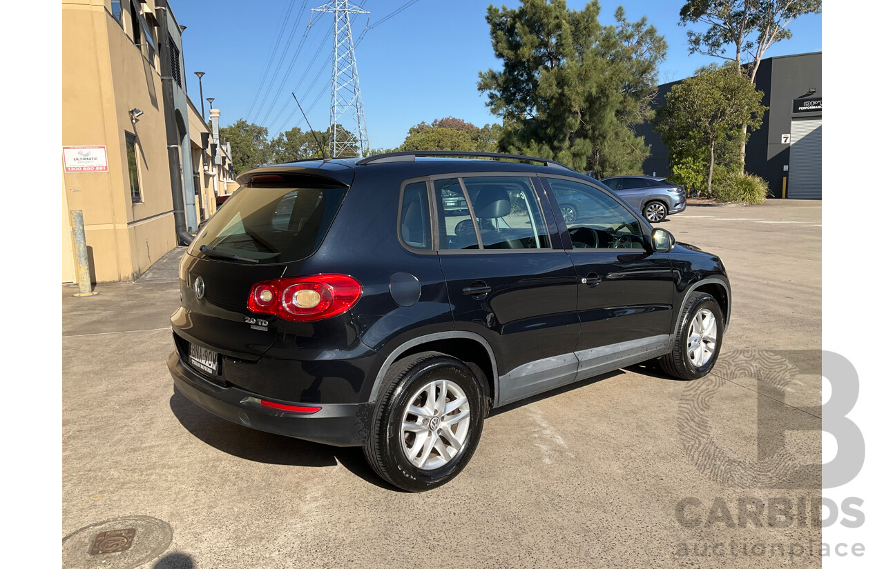 2/2010 Volkswagen Tiguan 103 TDI Pacific 5NC MY10 4d Wagon Black 2.0L
