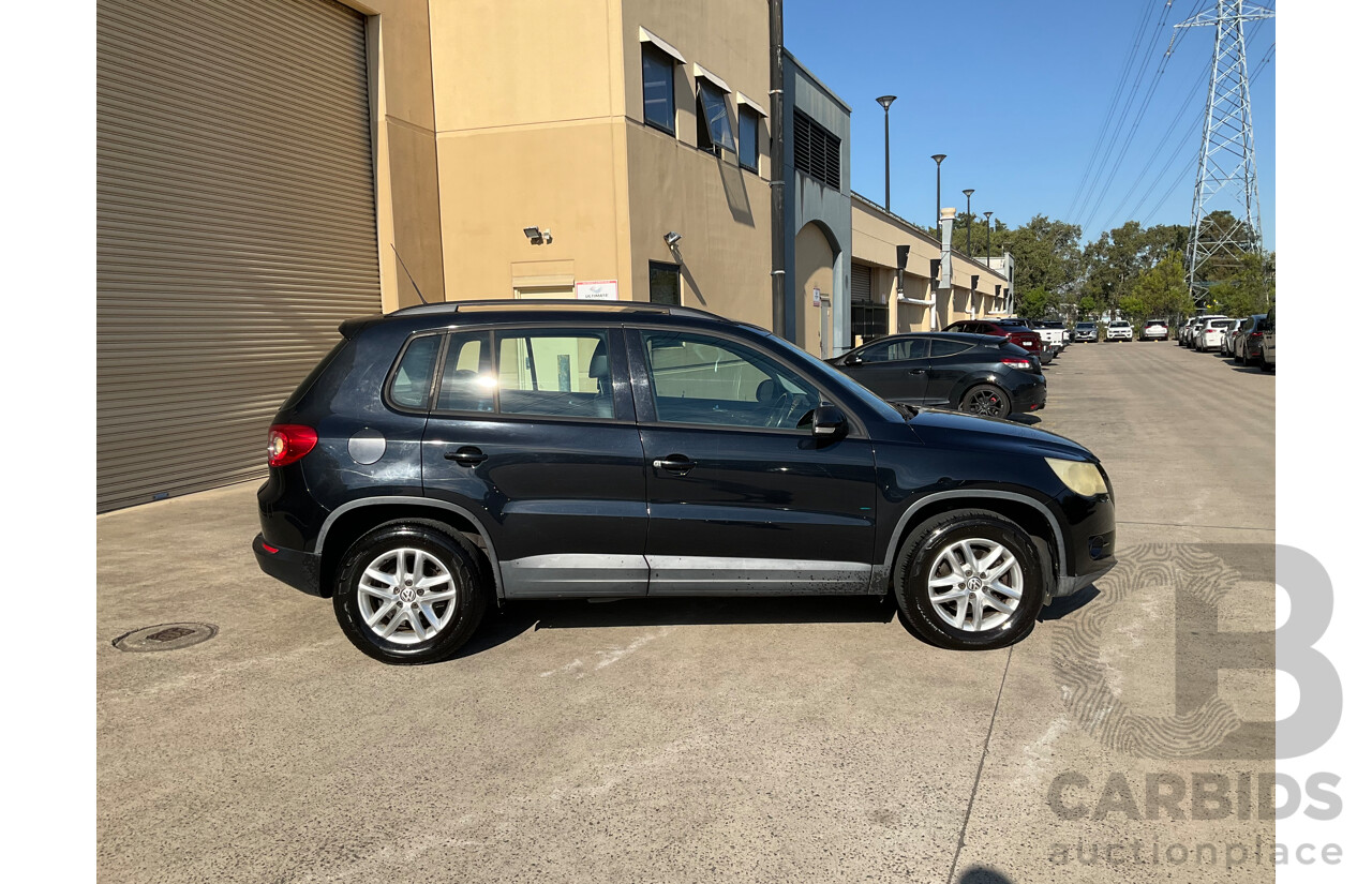2/2010 Volkswagen Tiguan 103 TDI Pacific 5NC MY10 4d Wagon Black 2.0L