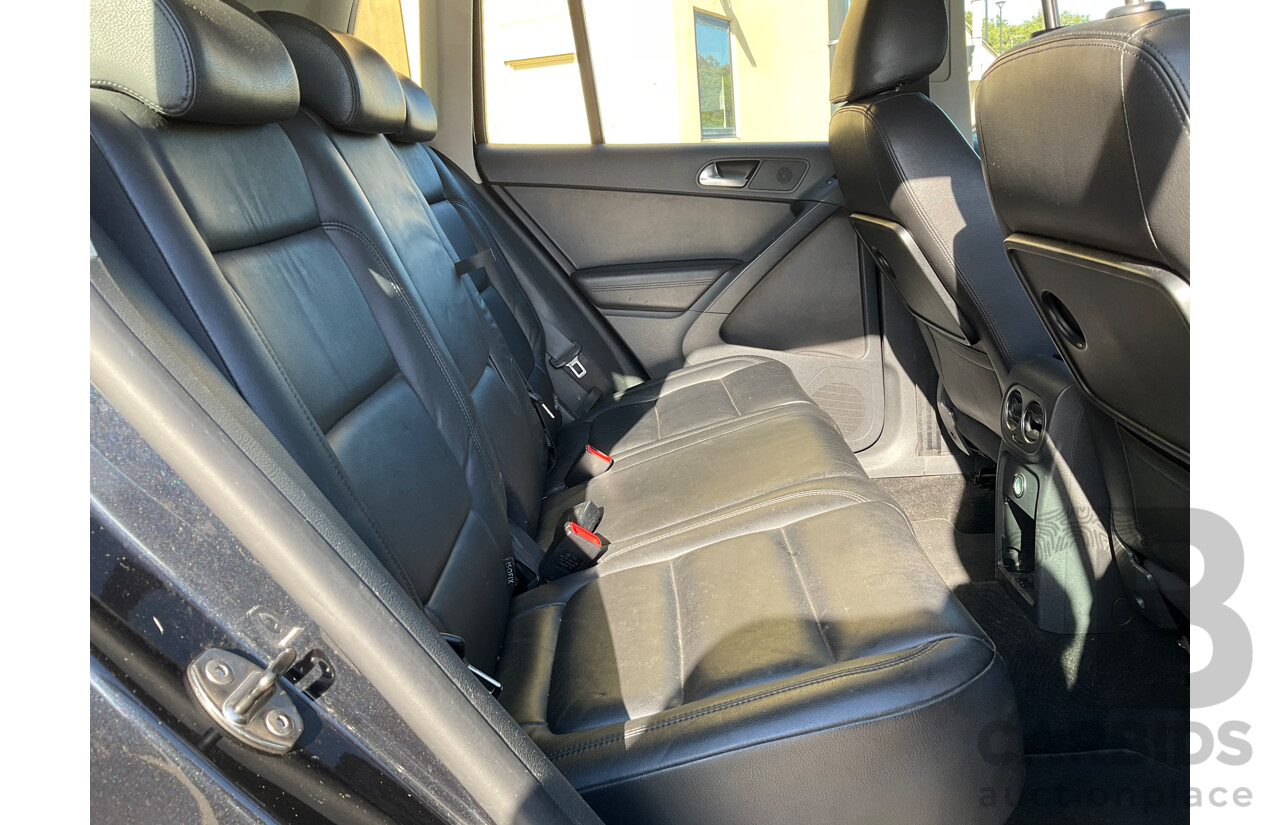 2/2010 Volkswagen Tiguan 103 TDI Pacific 5NC MY10 4d Wagon Black 2.0L