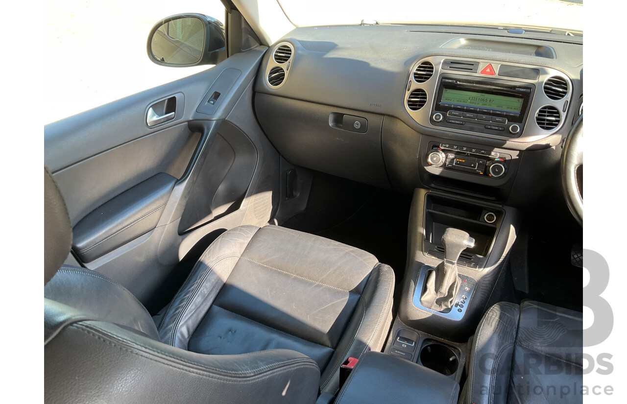 2/2010 Volkswagen Tiguan 103 TDI Pacific 5NC MY10 4d Wagon Black 2.0L