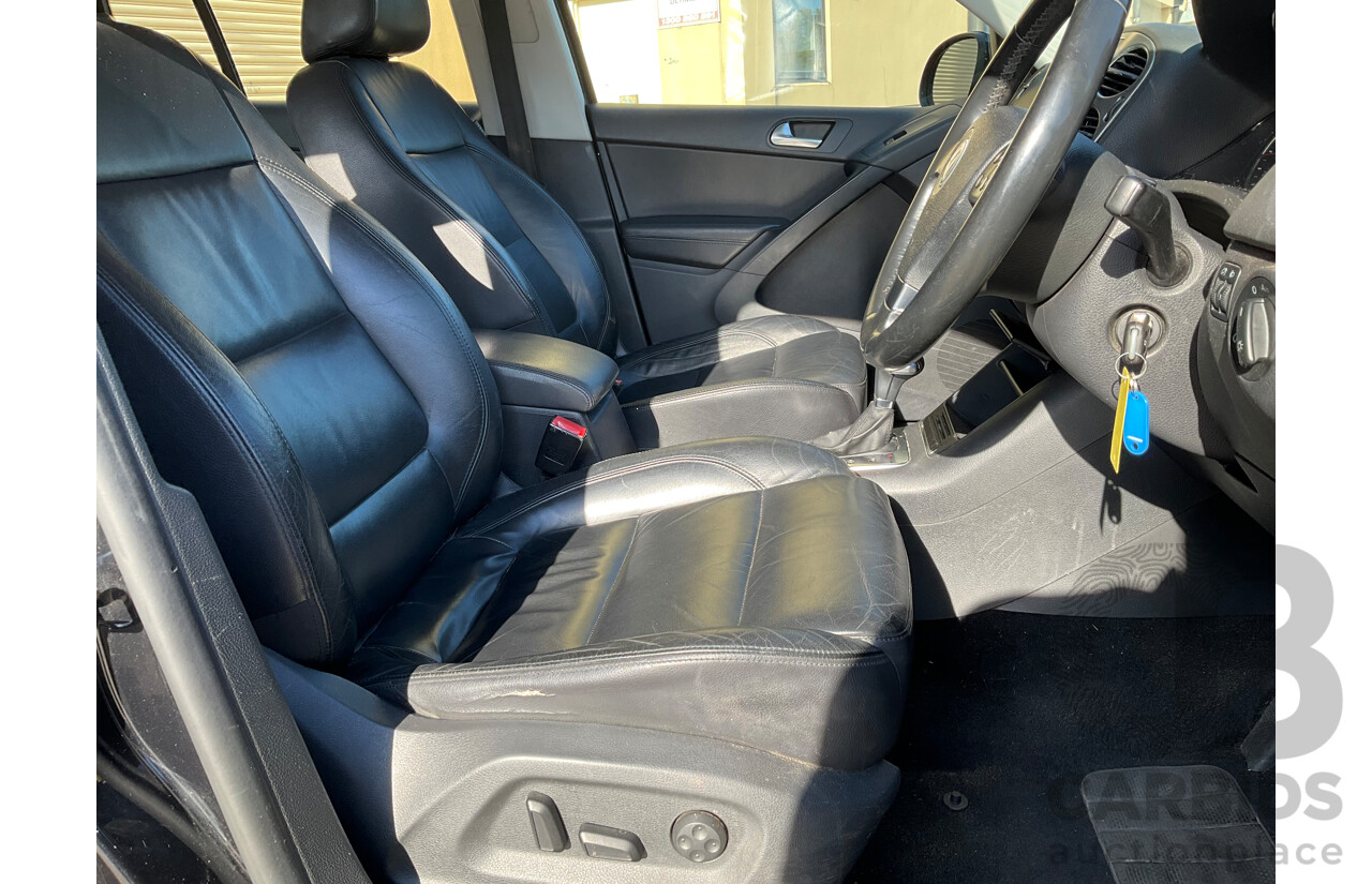 2/2010 Volkswagen Tiguan 103 TDI Pacific 5NC MY10 4d Wagon Black 2.0L