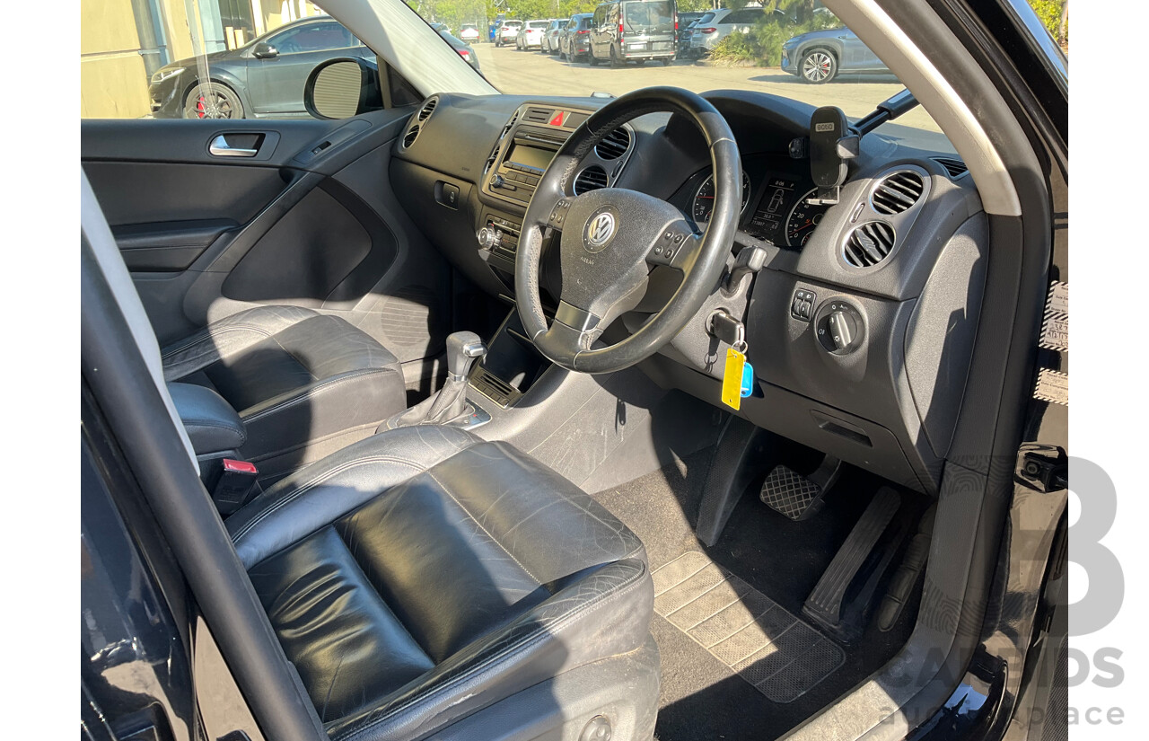 2/2010 Volkswagen Tiguan 103 TDI Pacific 5NC MY10 4d Wagon Black 2.0L