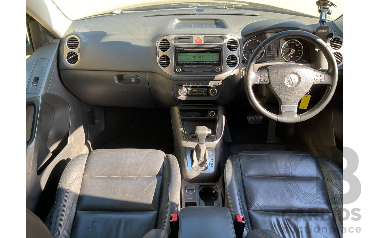 2/2010 Volkswagen Tiguan 103 TDI Pacific 5NC MY10 4d Wagon Black 2.0L