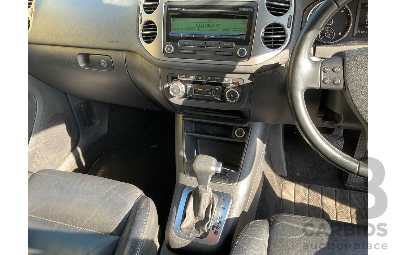 2/2010 Volkswagen Tiguan 103 TDI Pacific 5NC MY10 4d Wagon Black 2.0L