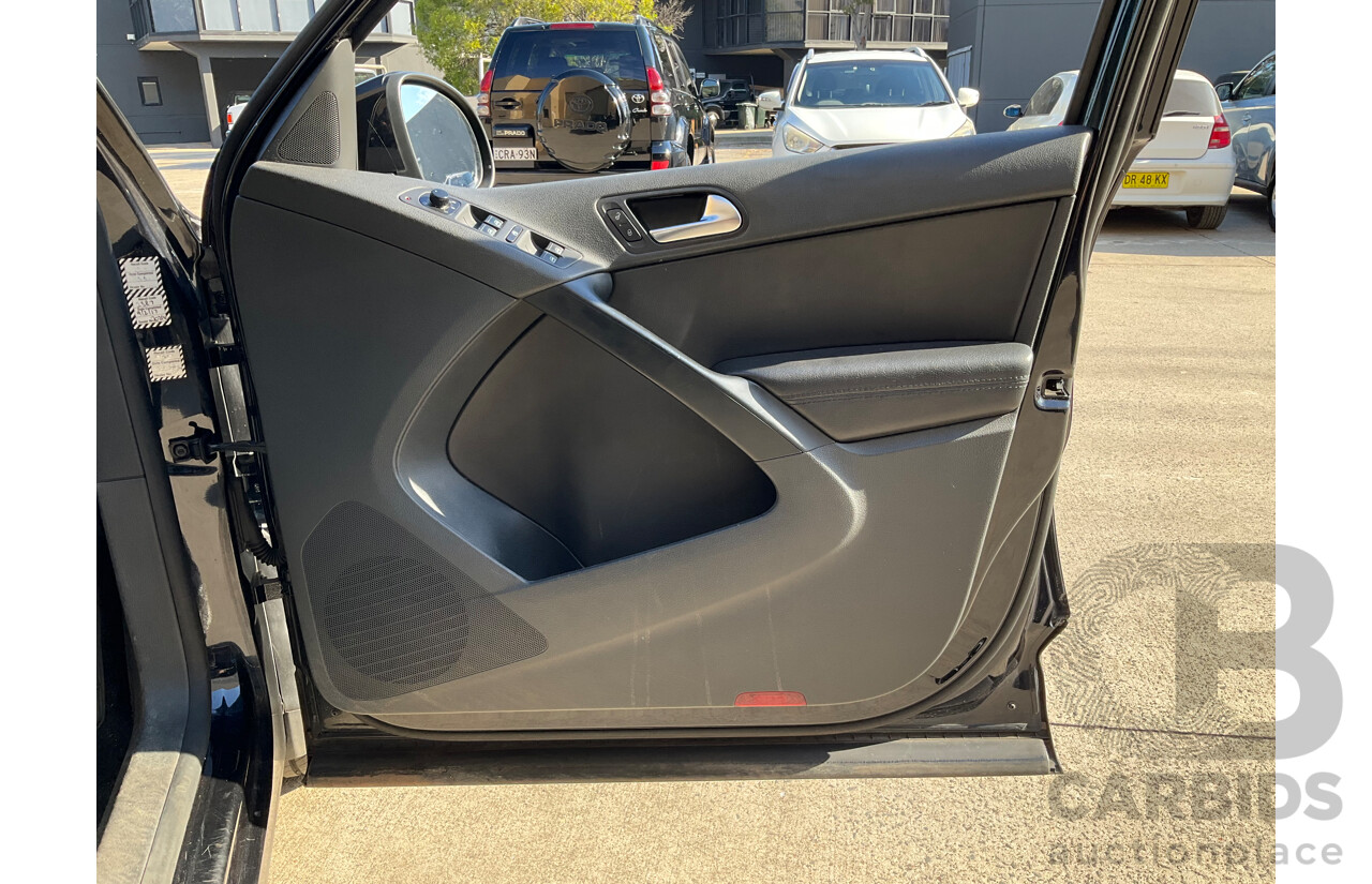 2/2010 Volkswagen Tiguan 103 TDI Pacific 5NC MY10 4d Wagon Black 2.0L