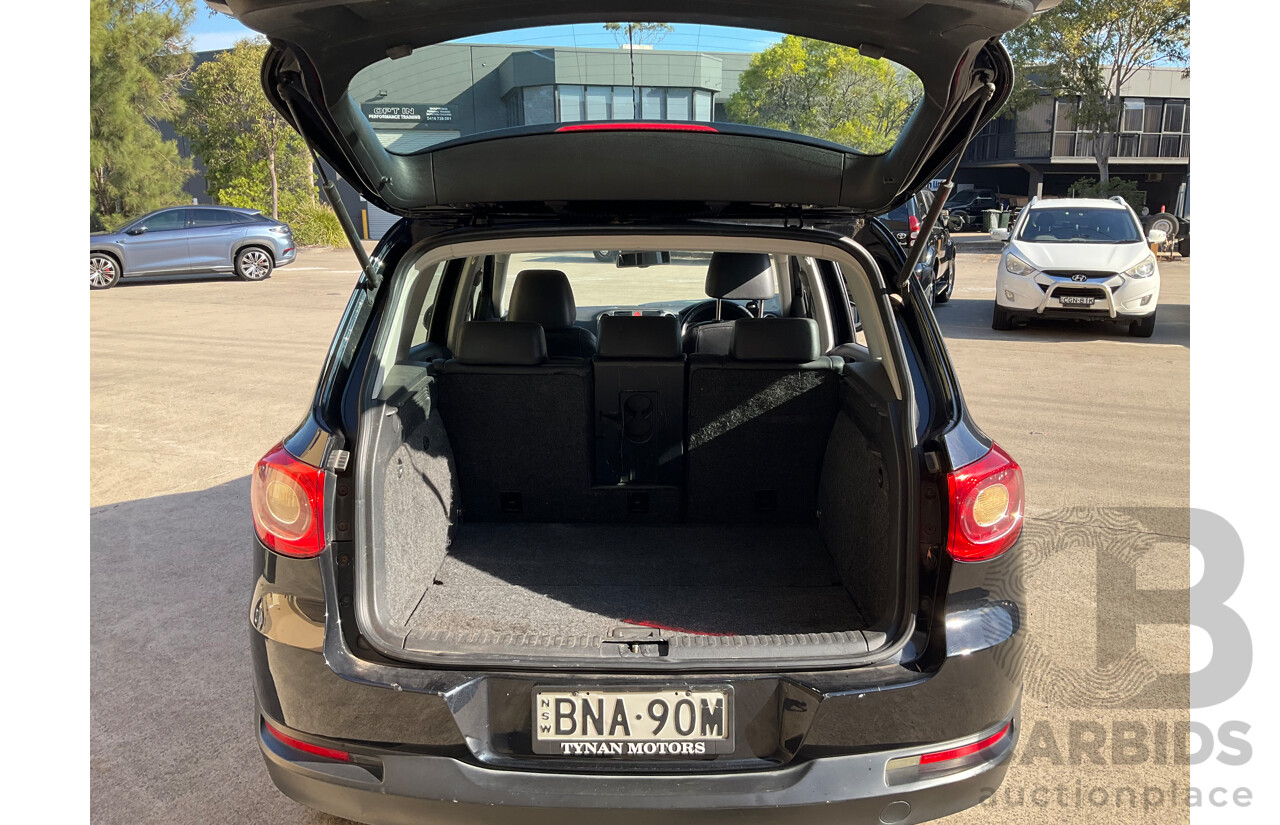 2/2010 Volkswagen Tiguan 103 TDI Pacific 5NC MY10 4d Wagon Black 2.0L