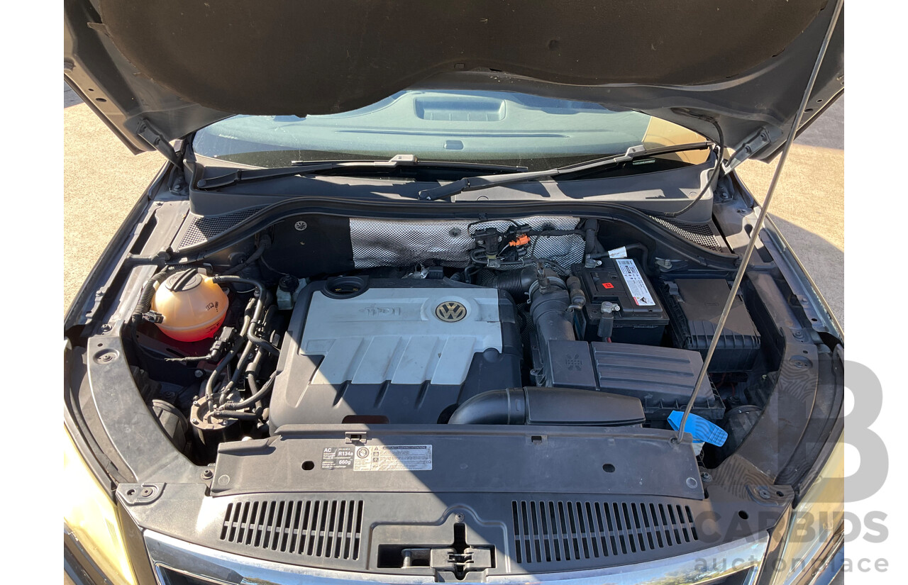 2/2010 Volkswagen Tiguan 103 TDI Pacific 5NC MY10 4d Wagon Black 2.0L