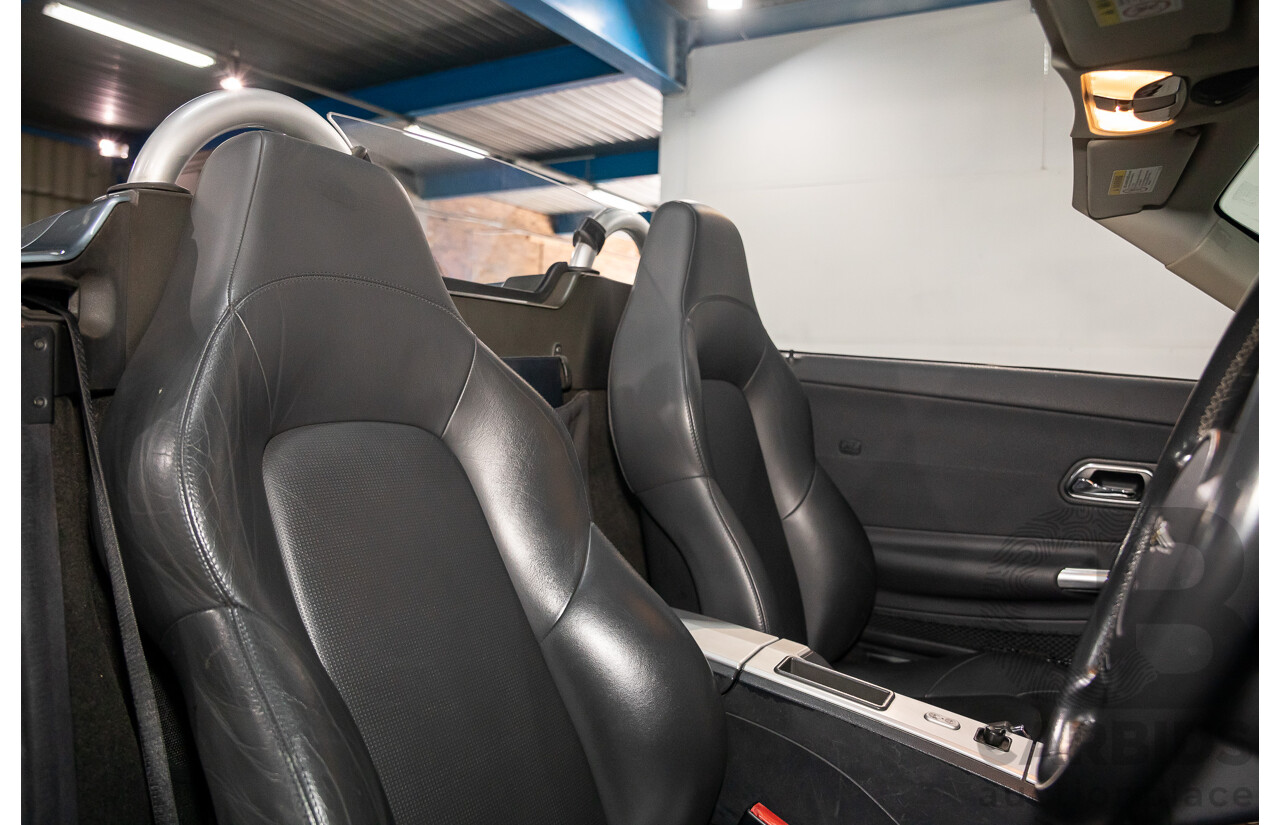 8/2004 Chrysler Crossfire Roadster ZH 2d Convertible Sapphire Silver Metallic V6 3.2L