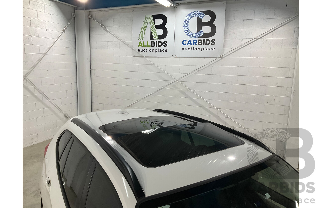 7/2013 BMW X1 sDrive20i E84 MY13 4d Wagon Alpine White Turbo 2.0L