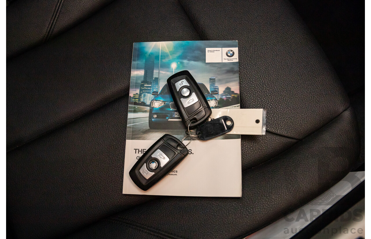 4/2013 BMW 118i F20 5d Hatchback Deep Sea Blue Metallic Turbo 1.6L