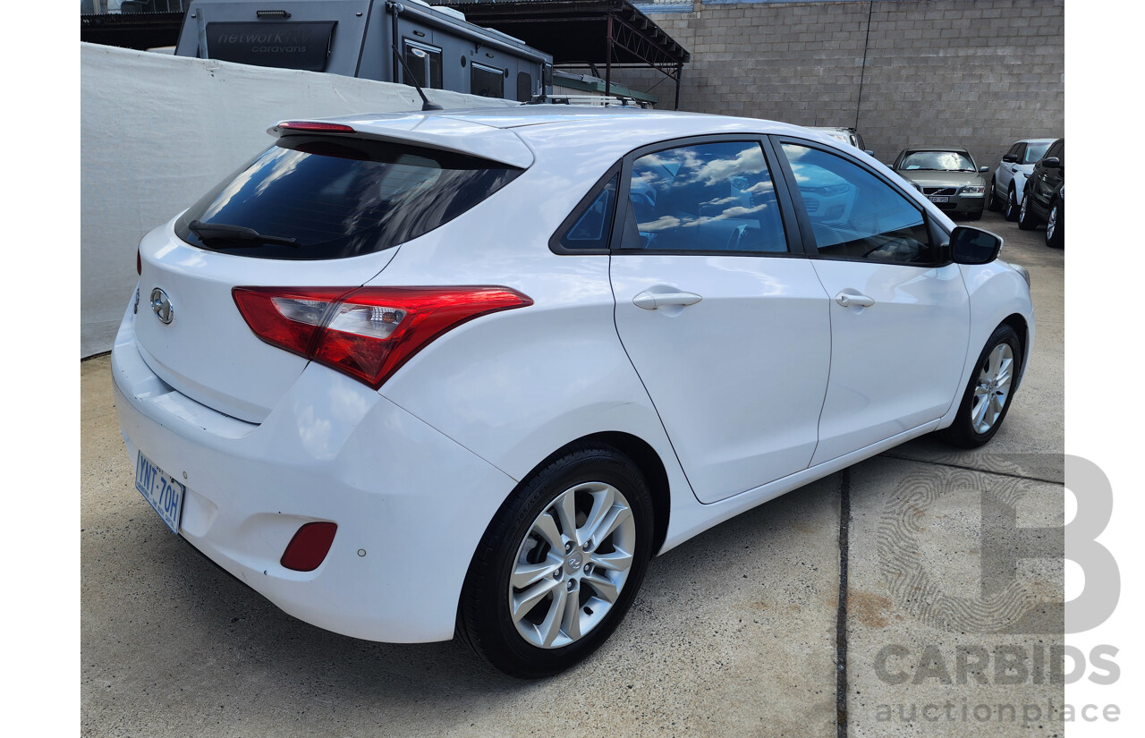 4/2014 Hyundai i30 Trophy GD MY14 5d Hatchback White 1.8L
